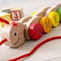 Personalised Colourful Pull Along Caterpillar Toy, thumbnail 2 of 3