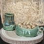 Handmade Porcelain Espresso Cup And Saucer Green Glaze With Sculptural Details, thumbnail 1 of 7