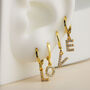 14k Gold Letter Initial Charm Huggie Earrings, thumbnail 1 of 9