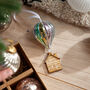Glass Hot Air Balloon Wooden House Christmas Decoration, thumbnail 2 of 2
