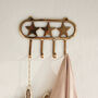 Recycled Brass Hanging Star Wall Hooks, thumbnail 1 of 4