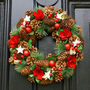 Festive Pine And Poinsettia Wreath, thumbnail 1 of 7