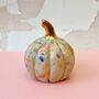 Handmade Ceramic Pumpkin With Gold Lustre Stem And Flecked Colourful Glaze, thumbnail 1 of 3