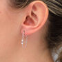 Gold Plated And Crystal Chain Huggie Earrings, thumbnail 1 of 6