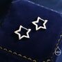 Sterling Silver Star Huggie Hoop Earrings, thumbnail 1 of 12