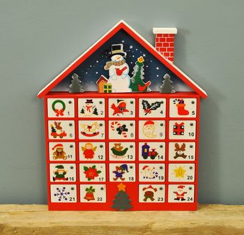 wooden house advent calendar by garden selections | notonthehighstreet.com