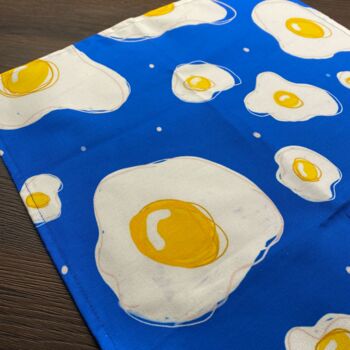 Fried Egg Pattern Full Colour Blue And Yellow Tea Towel, 3 of 3