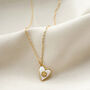 Gold Mother Of Pearl Heart And Flower Necklace, thumbnail 2 of 4