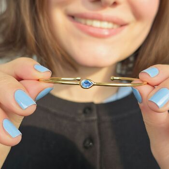 Blue Topaz December Birthstone Gold Plated Bangle, 4 of 5