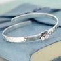 Personalised Crossover Bangle With Silver Daisy, thumbnail 1 of 6