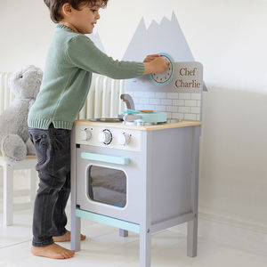 white and grey play kitchen