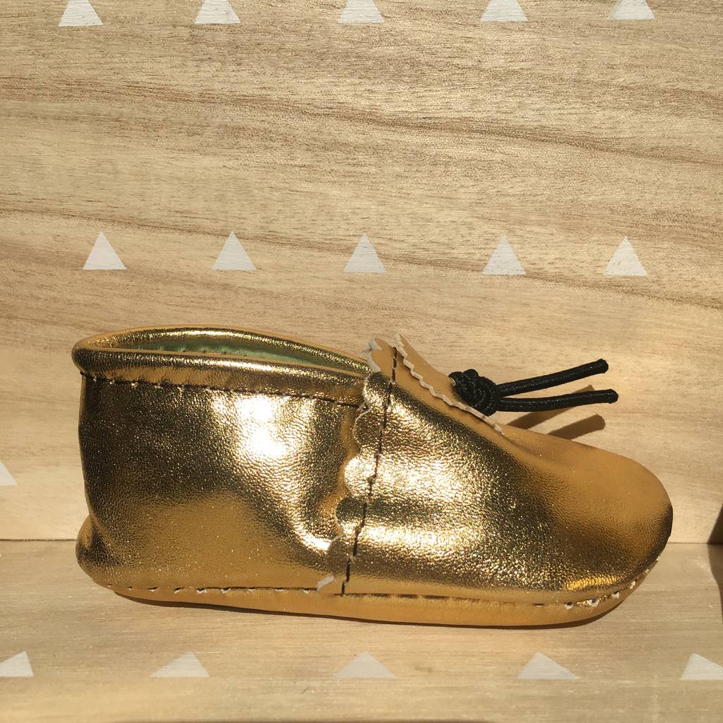 booties with gold trim