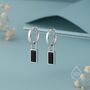 Sterling Silver Black Baguette Cut Cz Huggie Hoop Earrings, thumbnail 1 of 12