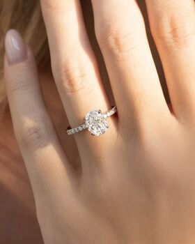 Two Ct Oval Solitaire Moissanite Engagement Ring With Pavé Band, 2 of 9
