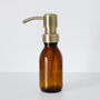 Refillable Amber Bottle With Brushed Gold Metal Pump, thumbnail 2 of 6