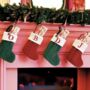 Personalised Christmas Knitted Stockings With Chocolates, thumbnail 1 of 6