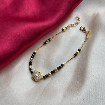 18k Gold Plated Black Bead Nazar Charm Bracelet, 2 of 5