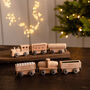 Personalised First Christmas Wooden Train Set, thumbnail 1 of 4