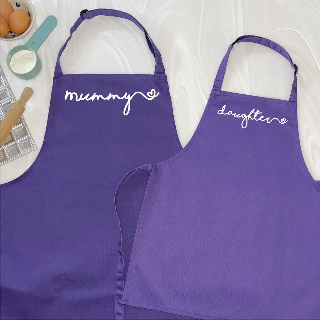 https://cdn.notonthehighstreet.com/fs/53/cc/f3cd-eb50-494f-ad94-9a9c06704de2/original_mummy-and-daughter-heart-apron-set.jpg