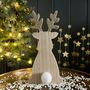 Wooden Sitting Reindeer Decoration, thumbnail 1 of 2