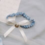 Lucky Silver Sixpence Blue And Ivory Wedding Garter, thumbnail 1 of 5