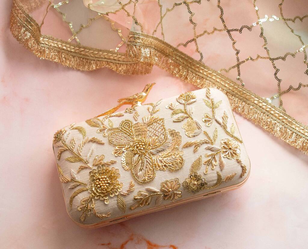 Arisha Nude Silk Bird Clasp Clutch By Atiya Choudhury