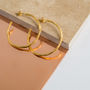 Olivera Large Brushed Gold Plated Hoop Earrings, thumbnail 1 of 5