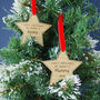 First Christmas As Mummy And Daddy Personalised Wooden Star Christmas Decorations, thumbnail 1 of 5