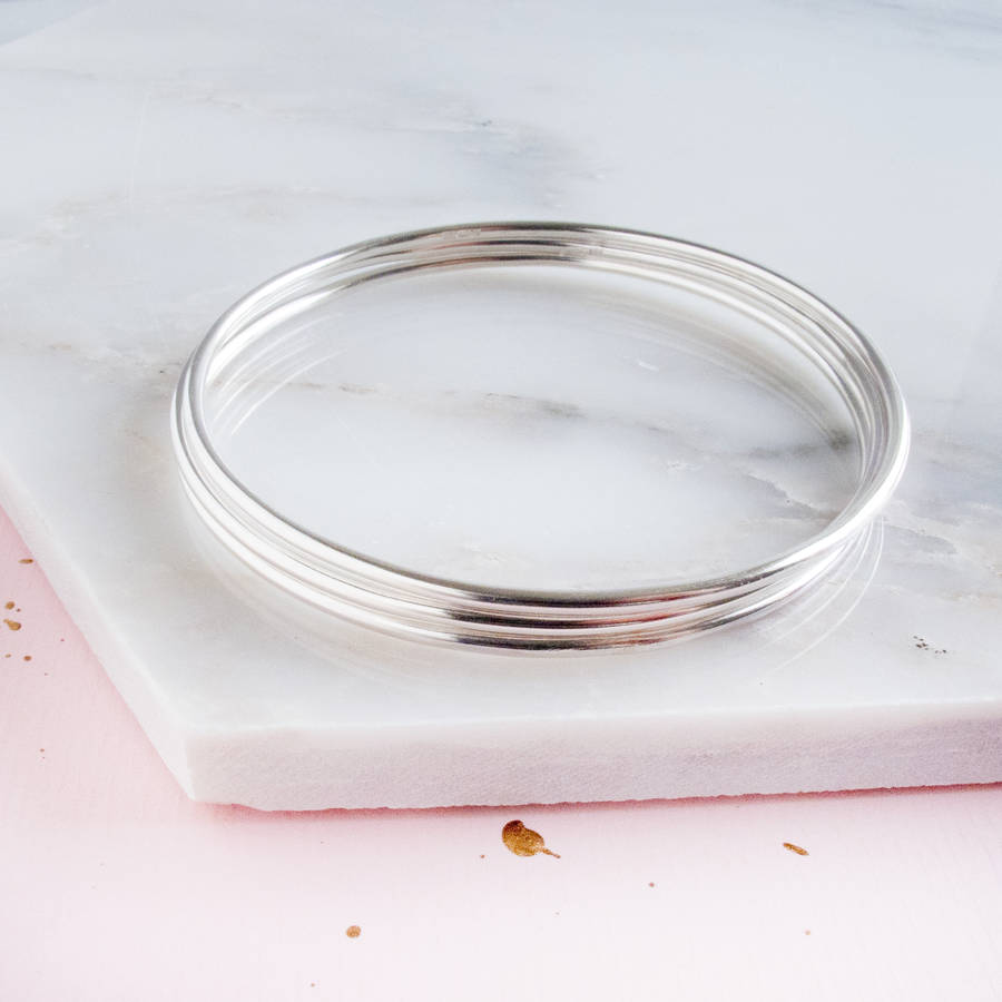 narrow silver bangle set by audrey claude jewellery ...