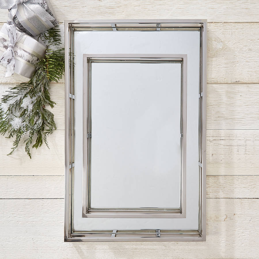 a set of two mirrored gallery trays by tommy's home