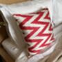Square Ikat Silk Cushion Coral Red Zigzag, thumbnail 7 of 9