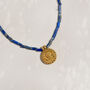 Blue Gemstone And Sun Talisman Coin Necklace, thumbnail 1 of 3