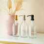 Refillable Clear Glass Bottle With Metal Pump, thumbnail 1 of 9