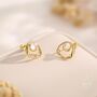 Sterling Silver Simulated Moonstone And Mobius Circle Stud Earrings, thumbnail 2 of 11