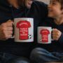 Personalised Daddy And Me Watching Football Mugs, thumbnail 1 of 6