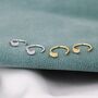 Sterilng Silver Tiny Crescent Moon Huggie Hoop Earrings, thumbnail 6 of 12