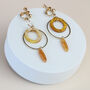 Gold And Orange Circle Dangle Clip On Earrings, thumbnail 2 of 3