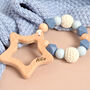 Personalised Blue Baby Teether With Engraved Wooden Star, thumbnail 1 of 4