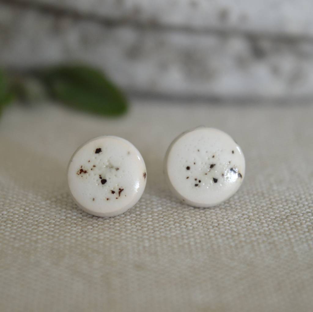 white ceramic stud earrings by isla clay