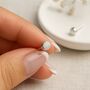 Sterling Silver White Opal Micro Stud Earrings: October Birthstone – 4mm, thumbnail 1 of 11