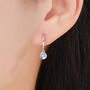Sterling Silver Dangle Moonstone Huggie Hoop, thumbnail 1 of 11