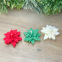 Christmas Poinsettia Flower Tealight Candles Set Of Three, thumbnail 6 of 9