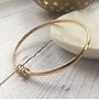 9ct Solid Yellow Gold Bangle With Rings, thumbnail 1 of 2