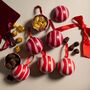 A Trio Of Scandi Baubles Filled With Chocolate Truffles, Arne And Lucia, thumbnail 1 of 2