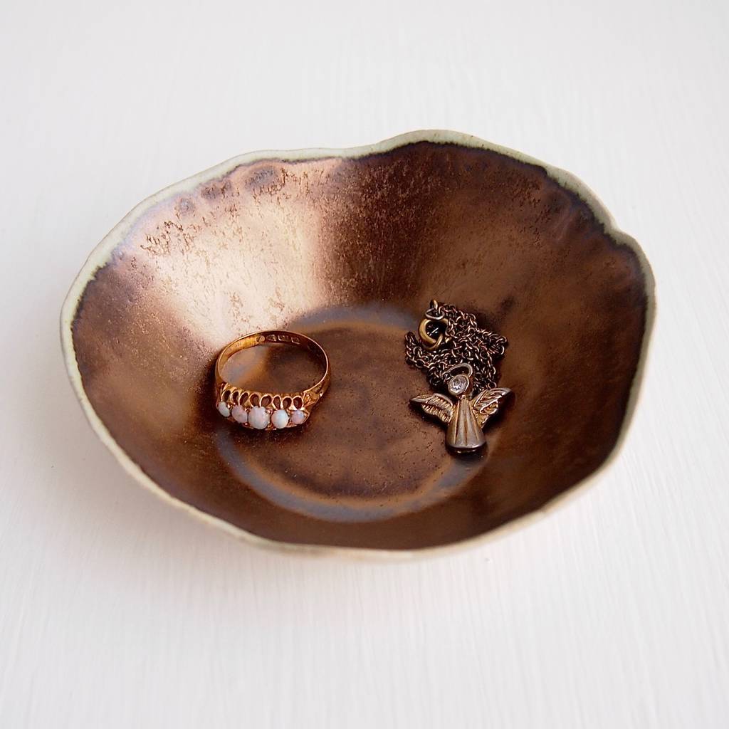 a handmade gold ceramic ring dish by