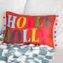 Red Holly Jolly Cushion With Pom Poms, thumbnail 1 of 4