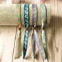 Set Of Four Festival Ribbon Bracelets, Waves/Words, thumbnail 3 of 5