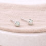 Sterling Silver White Opal Micro Stud Earrings – 4mm, thumbnail 1 of 9