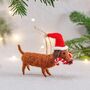 Sausage Dog With Candy Cane Felt Hanging Decoration, thumbnail 1 of 2