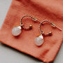 Rose Quartz Dropper Twisted Gold Hoop Earrings, thumbnail 1 of 4